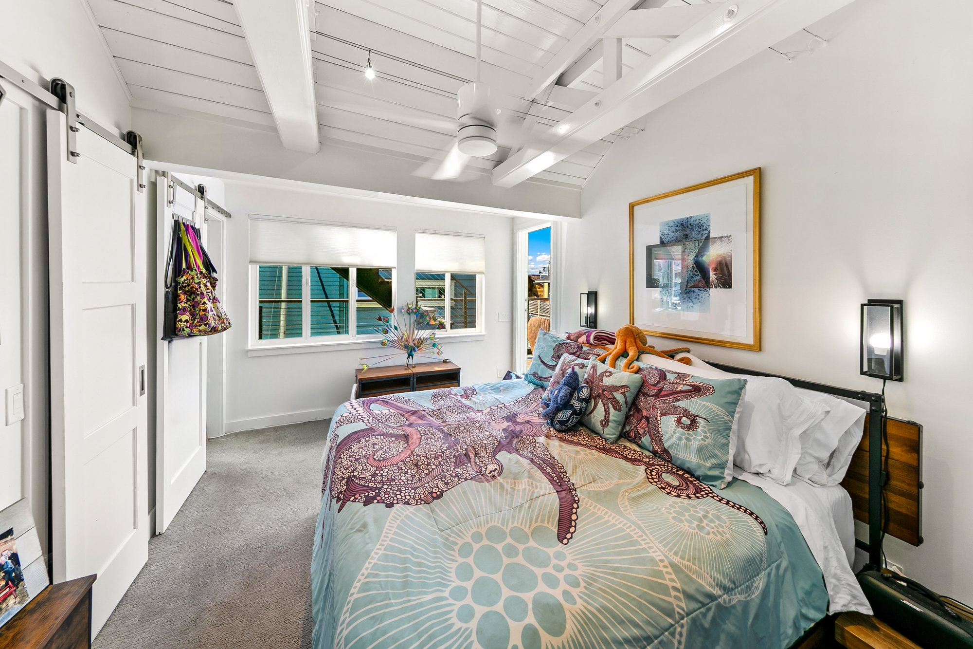 Bright Floating Home bedroom with white paneled ceiling