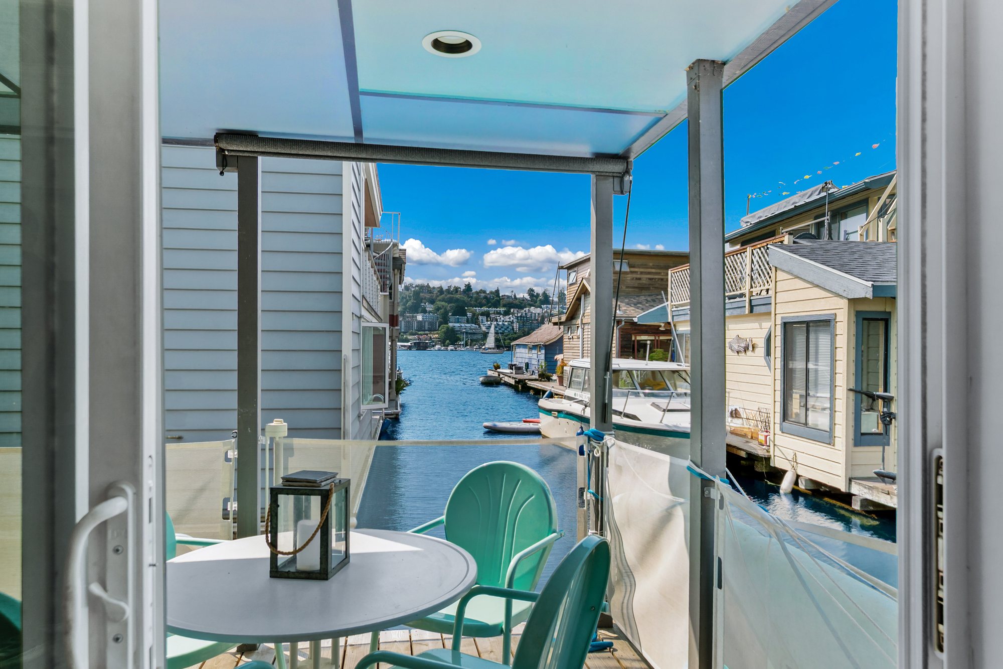 Covered balcony with a view along the waterway