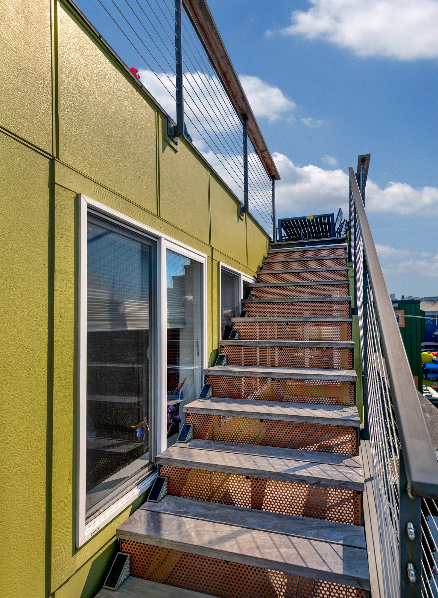 Exterior stairs leading to the Floating Home rooftop