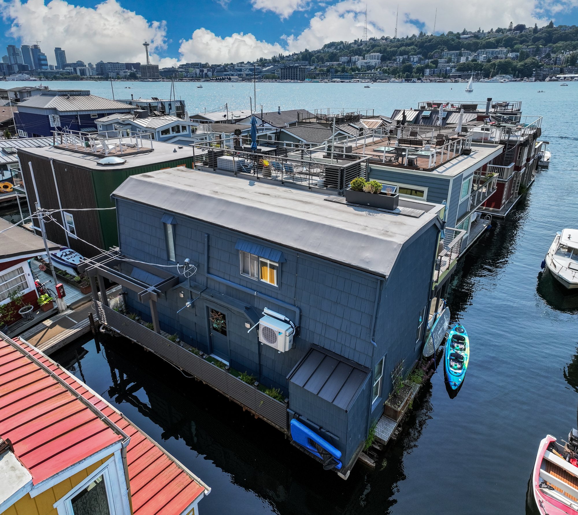 Aerial view across the Floating Home roof and waterway