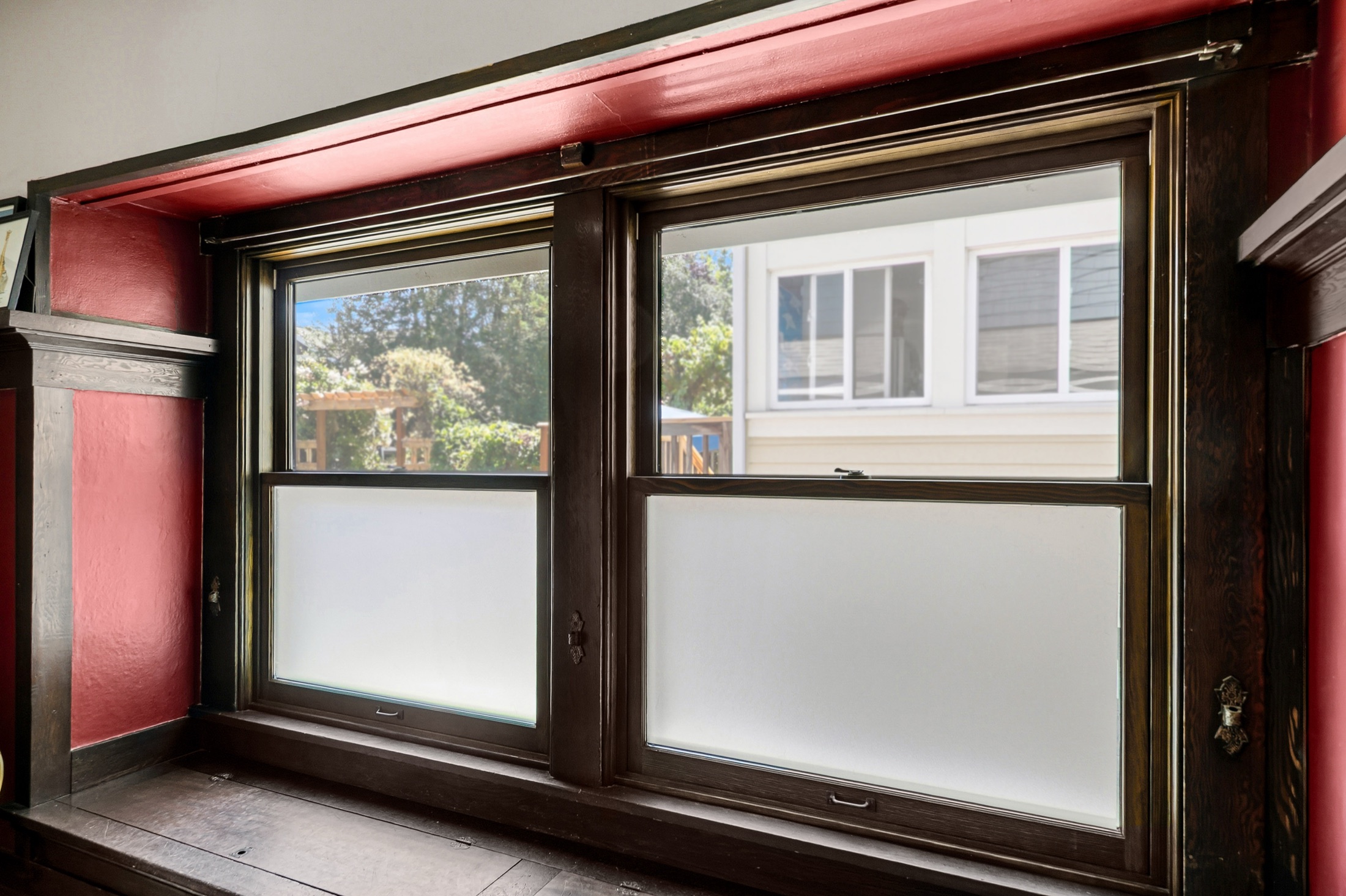 Craftsman windows with stained wood trim in the Madrona home