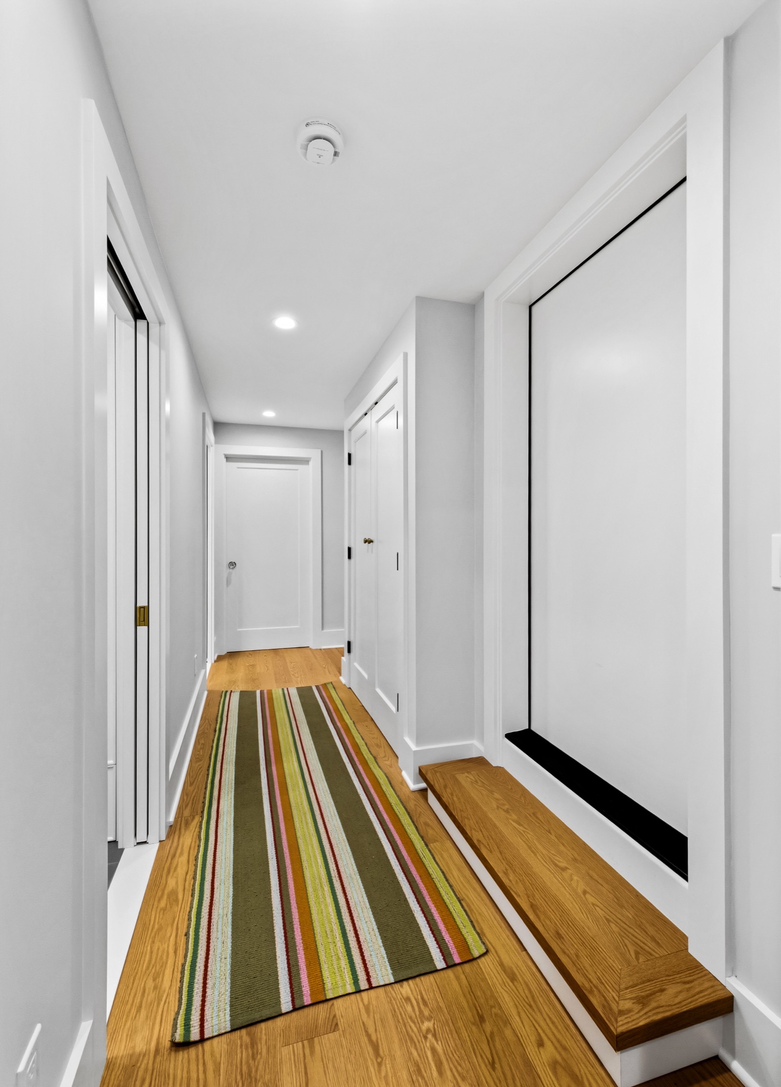 Tangletown hallway leading to the remodeled laundry room