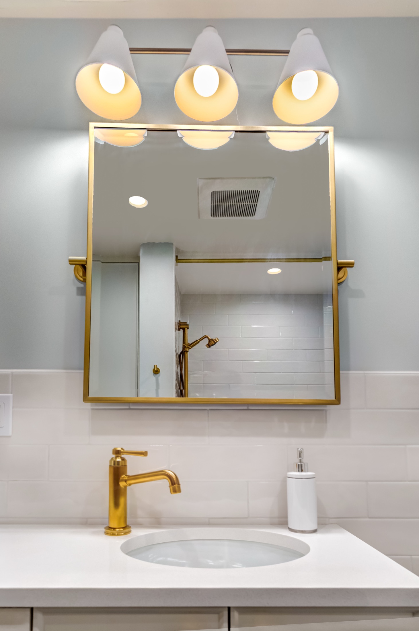Bathroom vanity mirror and three-light fixture