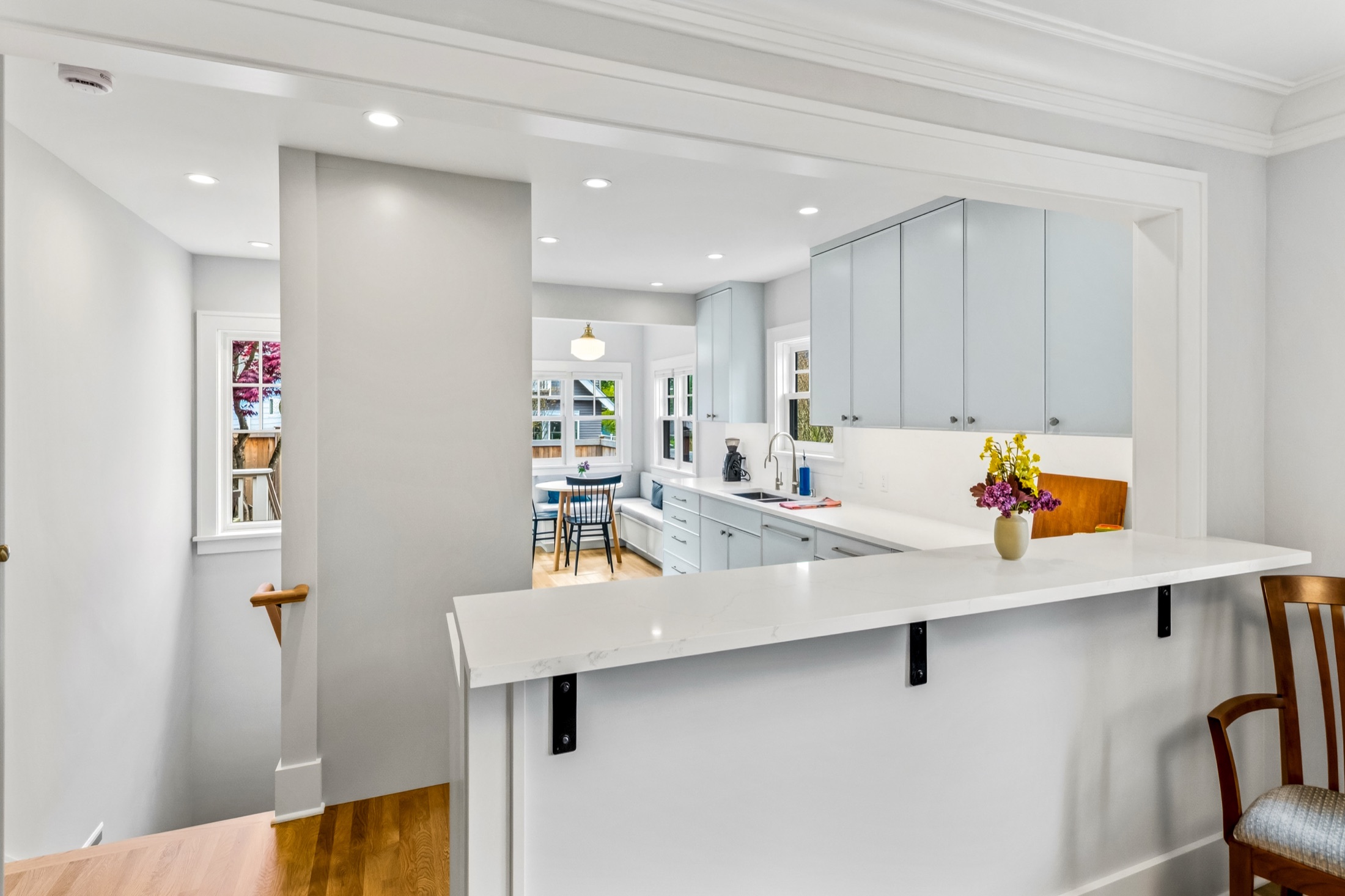Open kitchen with large island connecting to the dining area