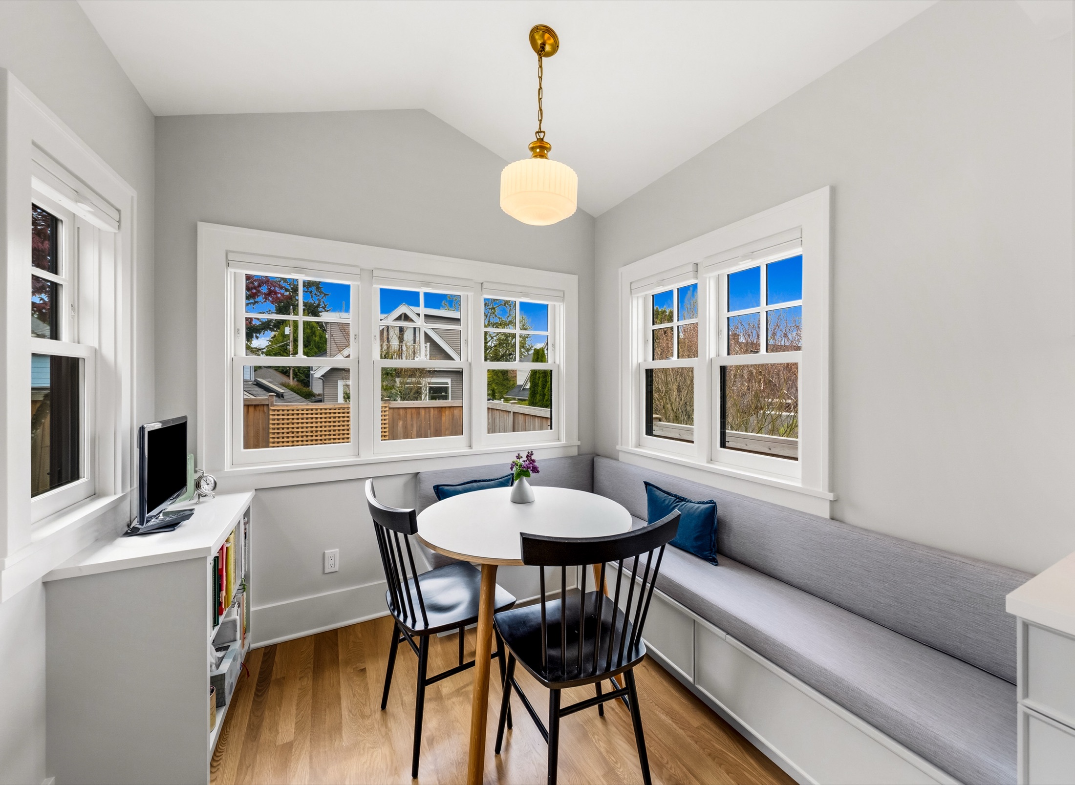 Bright breakfast nook with built-in bench seating