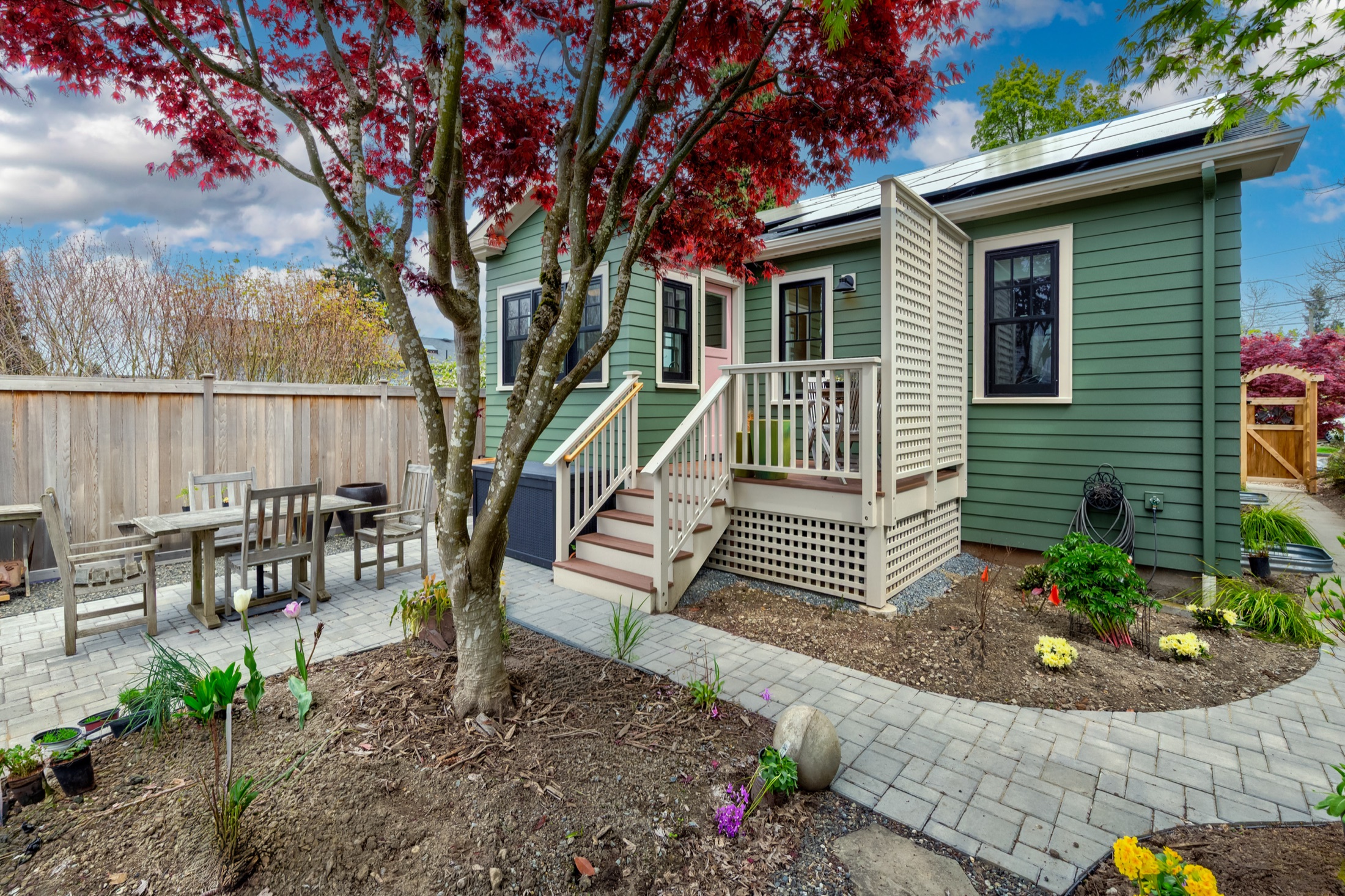 Rear addition and curved garden path in Tangletown